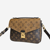 Monogram Canvas reverse Pochette metis
