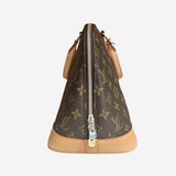 Monogram Canvas Alma PM
