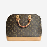 Monogram Canvas Alma PM