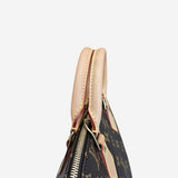 Monogram Canvas Alma PM