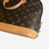 Monogram Canvas Alma PM