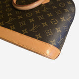 Monogram Canvas Alma PM