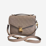 Monogram Empreinte Pochette metis