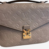 Monogram Empreinte Pochette metis