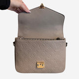 Monogram Empreinte Pochette metis