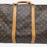 MONOGRAM CANVAS KEEPALL 60 BANDOULIERE taske fra brand: LOUIS VUITTON - We Do Vintage