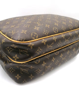 Monogram Canvas Reporter GM taske fra brand: LOUIS VUITTON - We Do Vintage