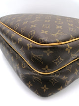 Monogram Canvas Reporter GM taske fra brand: LOUIS VUITTON - We Do Vintage