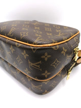 Monogram Canvas Reporter PM taske fra brand: LOUIS VUITTON - We Do Vintage