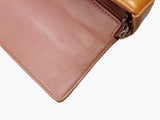 Orange patent east west chocolate bar taske fra brand: CHANEL - We Do Vintage