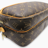Monogram Canvas Reporter PM taske fra brand: LOUIS VUITTON - We Do Vintage