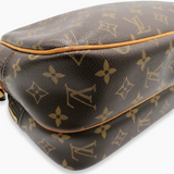 Monogram Canvas Reporter PM taske fra brand: LOUIS VUITTON - We Do Vintage