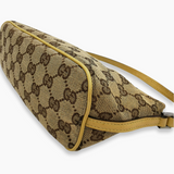 Brown Diamant Canvas boat pochette taske fra brand: GUCCI - We Do Vintage