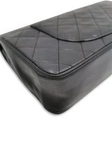 Sort Classic double flap reissue chain medium taske fra brand: CHANEL - We Do Vintage