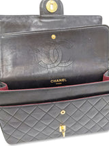 Sort Classic double flap reissue chain medium taske fra brand: CHANEL - We Do Vintage