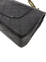 Sort Classic double flap medium taske fra brand: CHANEL - We Do Vintage