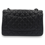 Sort caviar jumbo Classic double flap taske fra brand: CHANEL - We Do Vintage