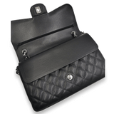 Sort caviar jumbo Classic double flap taske fra brand: CHANEL - We Do Vintage