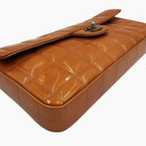 Orange patent east west chocolate bar taske fra brand: CHANEL - We Do Vintage