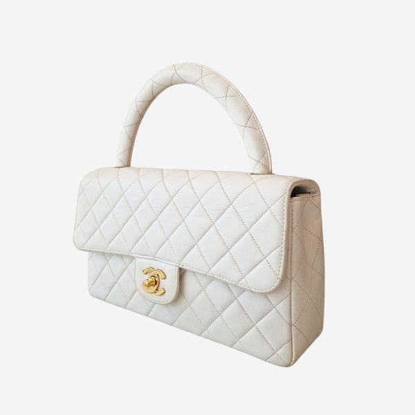 vintage top handle parent kelly flap bag