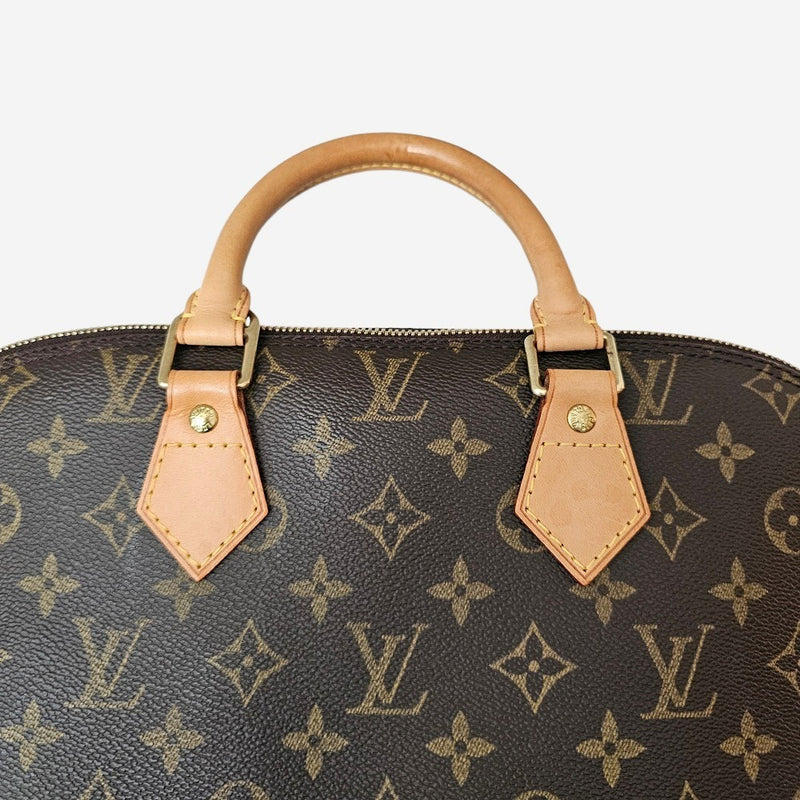Monogram Canvas Alma PM