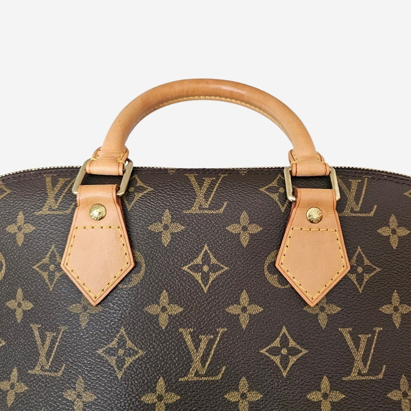Monogram Canvas Alma PM