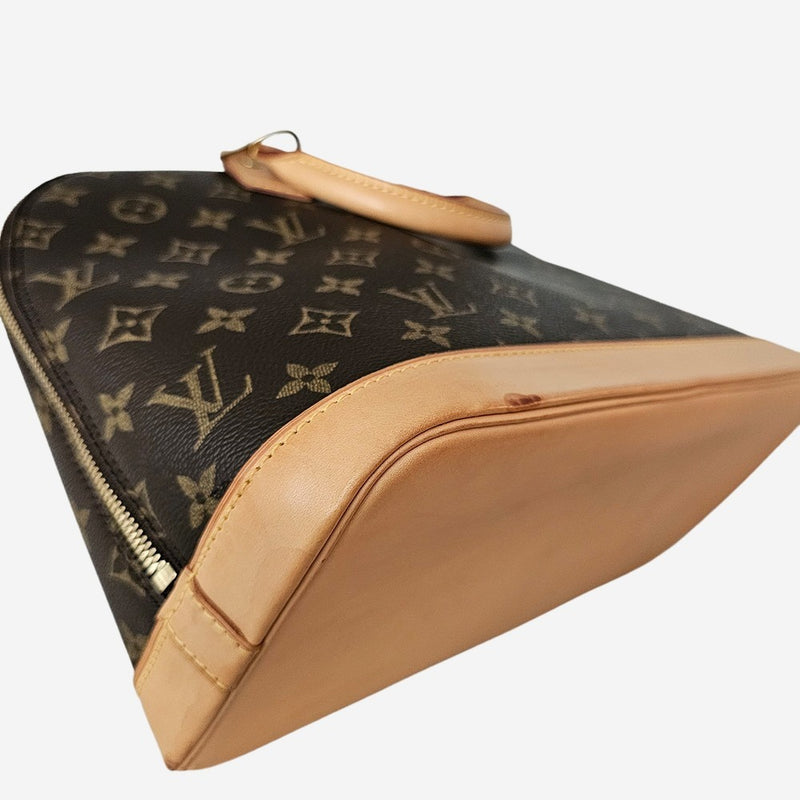 Monogram Canvas Alma PM