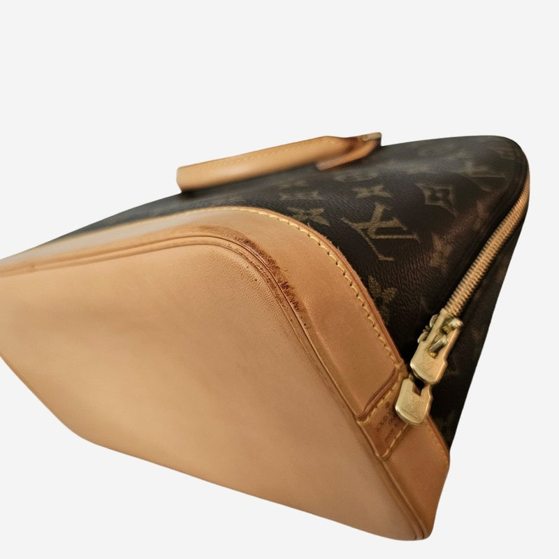 Monogram Canvas Alma PM