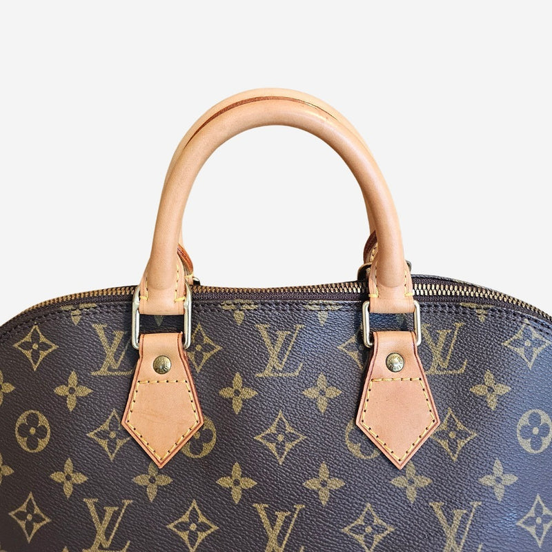 Monogram Canvas Alma PM
