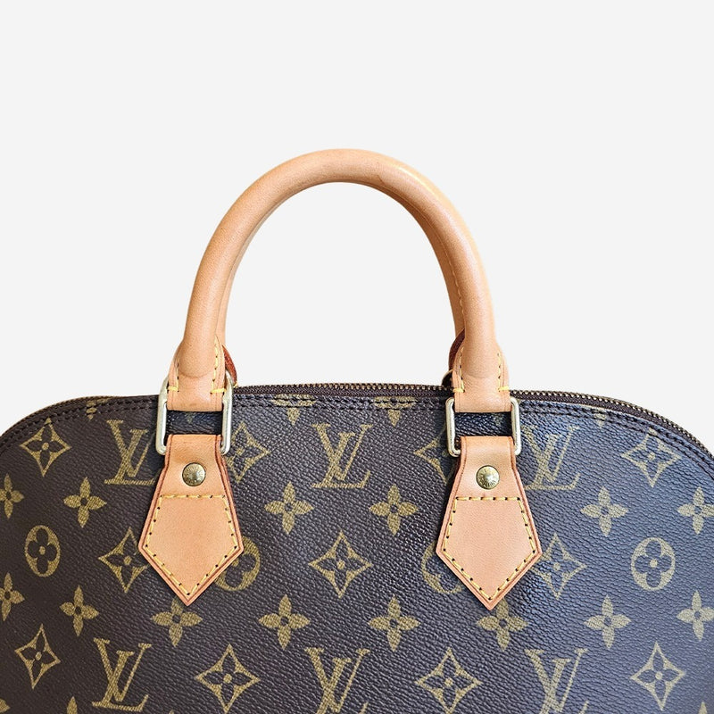 Monogram Canvas Alma PM