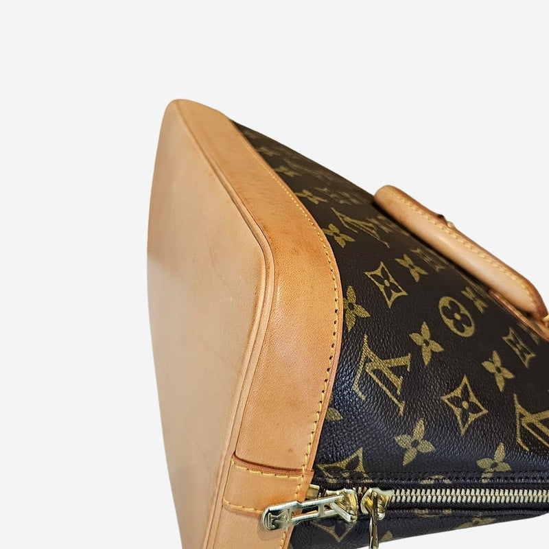 Monogram Canvas Alma PM