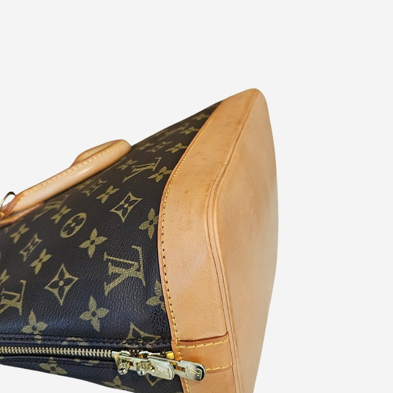 Monogram Canvas Alma PM