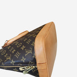 Monogram Canvas Alma PM