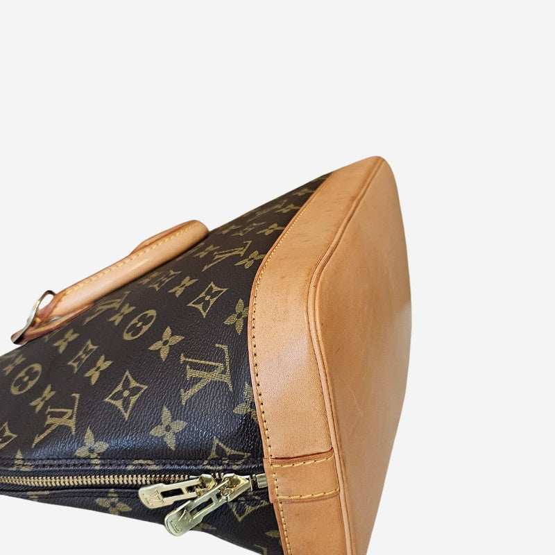 Monogram Canvas Alma PM