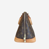 Monogram Canvas Alma PM