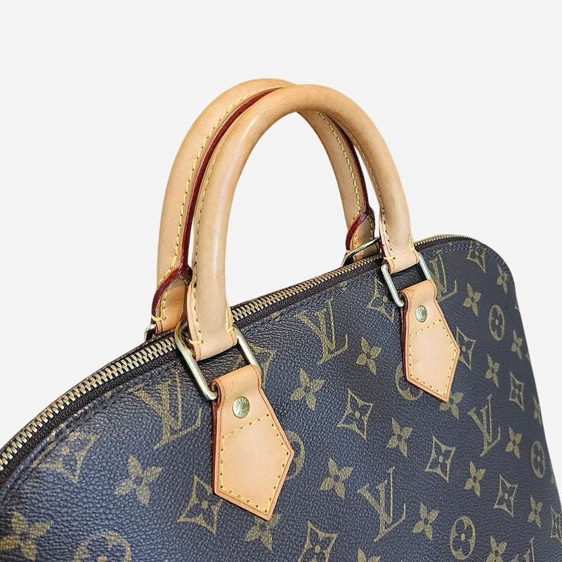 Monogram Canvas Alma PM