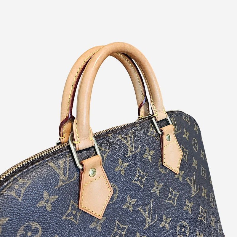 Monogram Canvas Alma PM