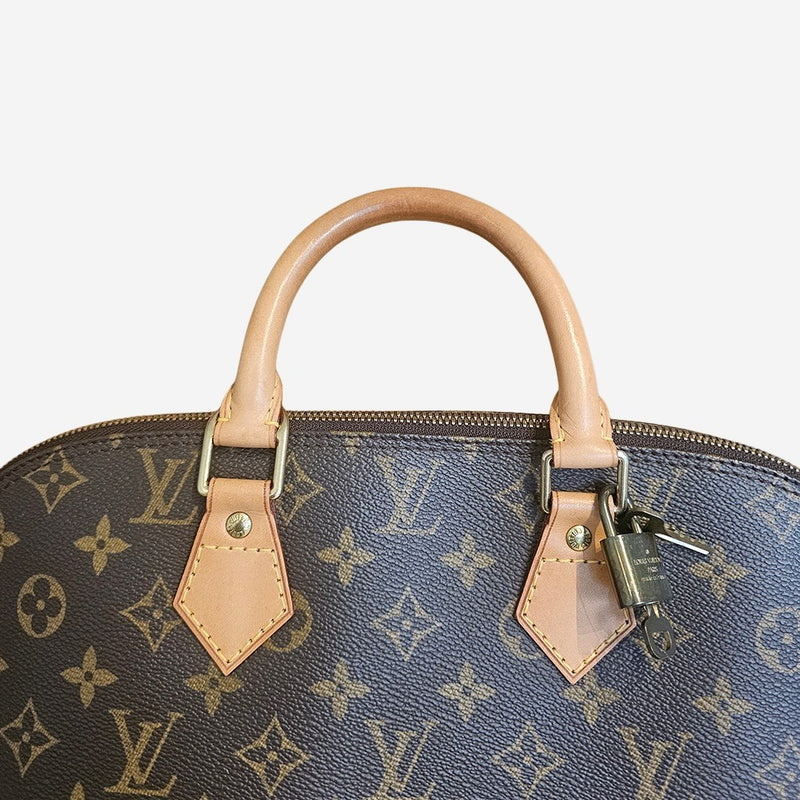 Monogram Canvas Alma PM