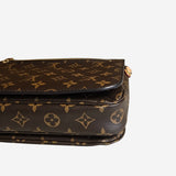 Monogram Canvas Pochette metis