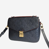 Monogram Empreinte Pochette metis