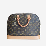 Monogram Canvas Alma PM