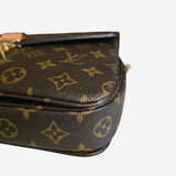 Monogram Canvas Pochette metis