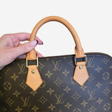 Monogram Canvas Alma PM