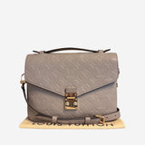 Monogram Empreinte Pochette metis