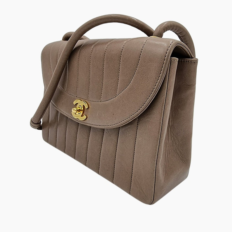 Vintage Mademoiselle quilted flap bag taske fra brand: CHANEL - We Do Vintage