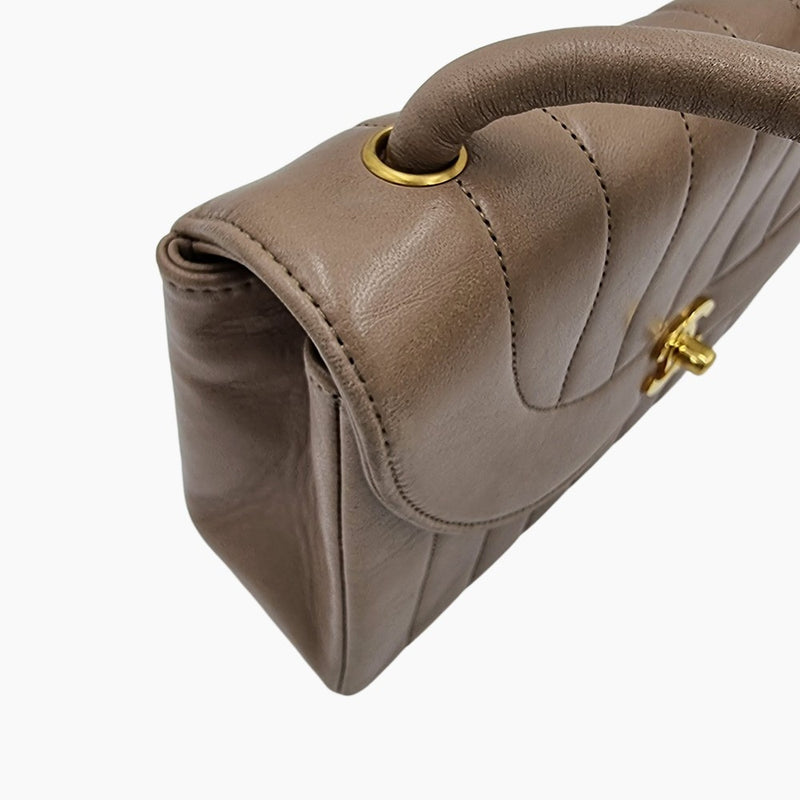 Vintage Mademoiselle quilted flap bag taske fra brand: CHANEL - We Do Vintage