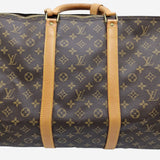 MONOGRAM CANVAS KEEPALL 60 BANDOULIERE taske fra brand: LOUIS VUITTON - We Do Vintage