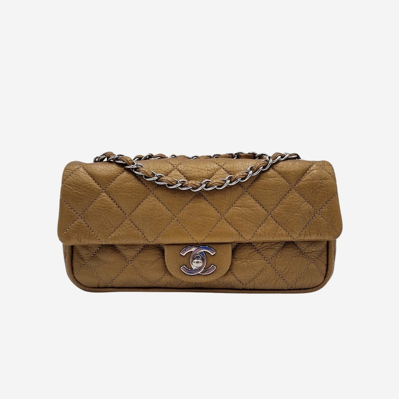 Dark gold east west flap bag
