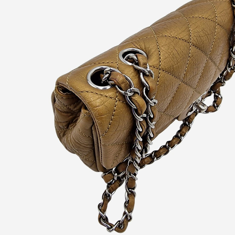 Dark gold east west flap bag