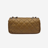 Dark gold east west flap bag